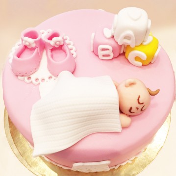 Gâteau baby shower poupon